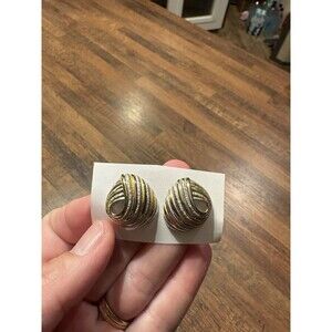 Vintage earrings from the Trifari collection two-tone gold and silver design.